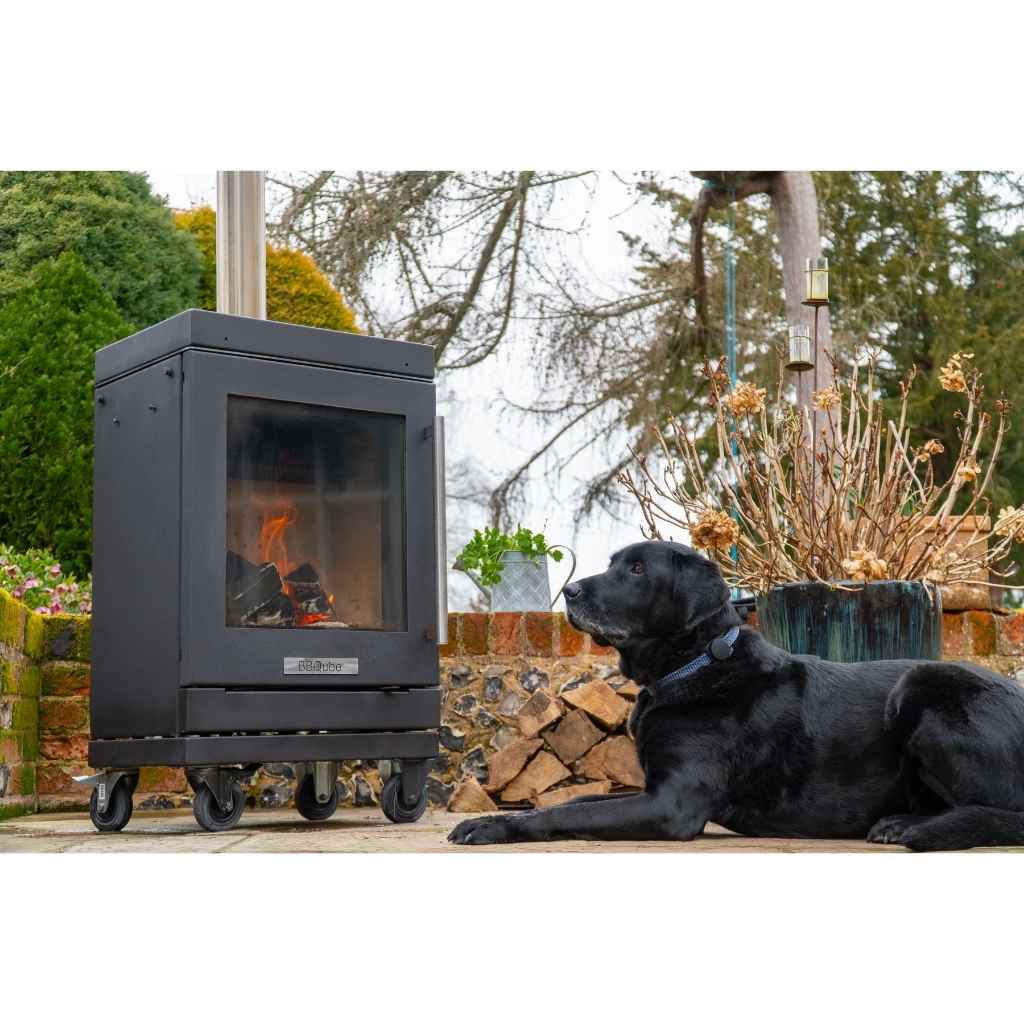 BBQube HeatQube heater beside dog