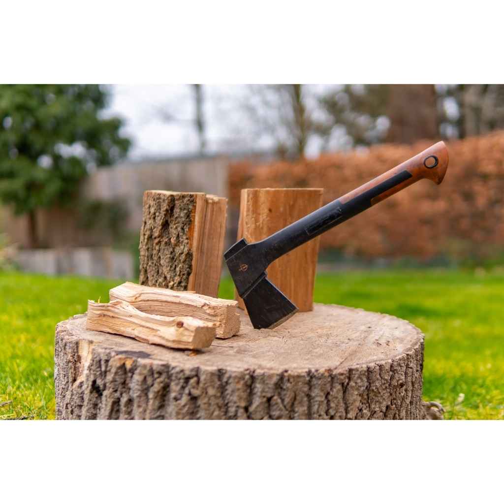 BBQube axe splitting firewood on stump